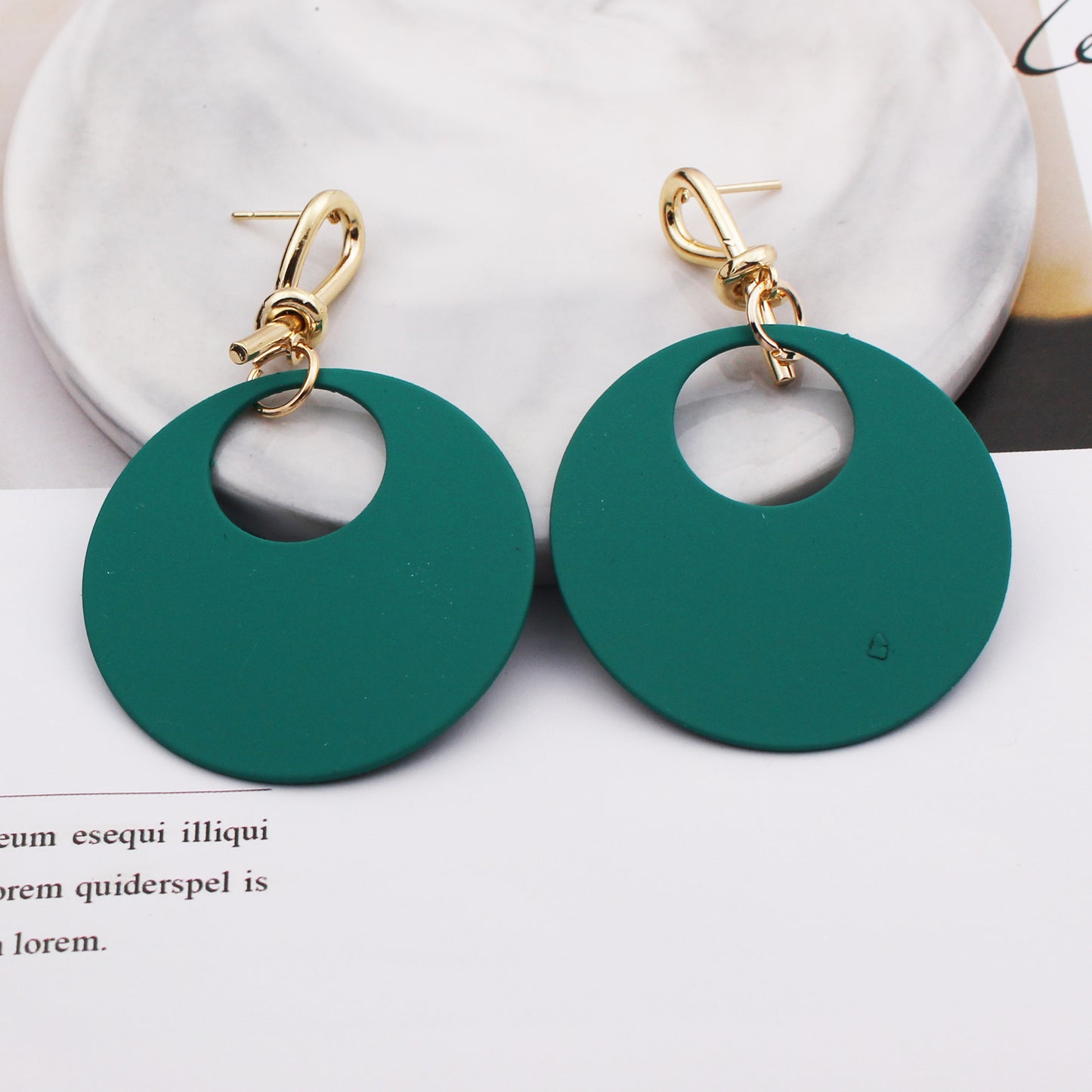 Female round face with circle earrings