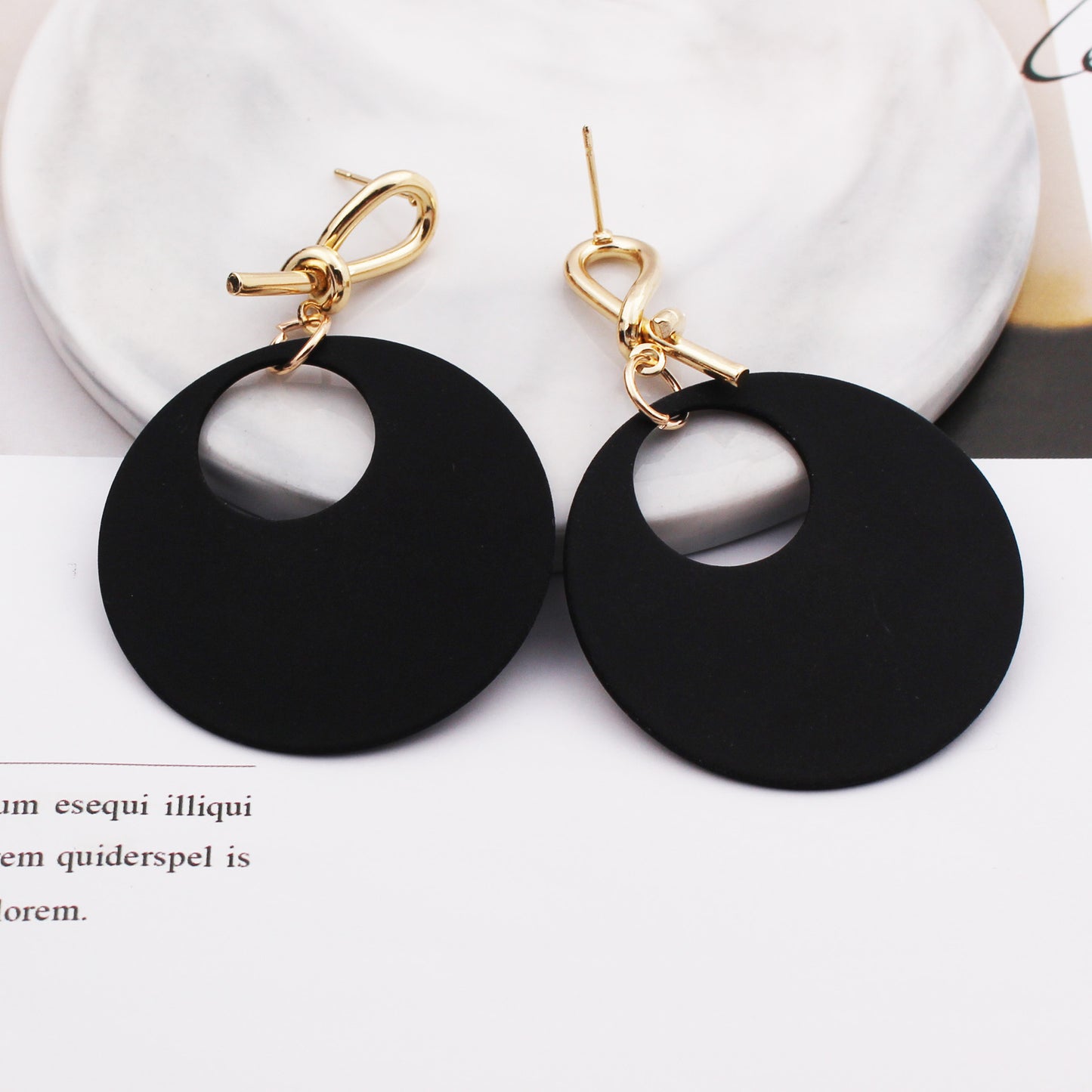 Female round face with circle earrings