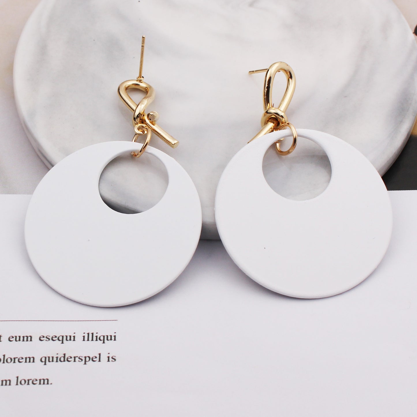 Female round face with circle earrings